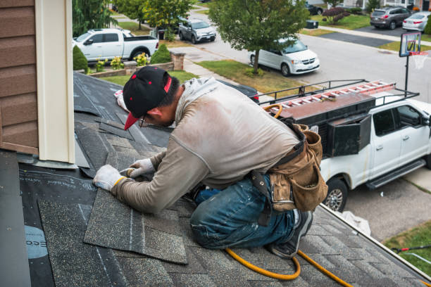 Professional Roofing technician working in Salfordville, PA